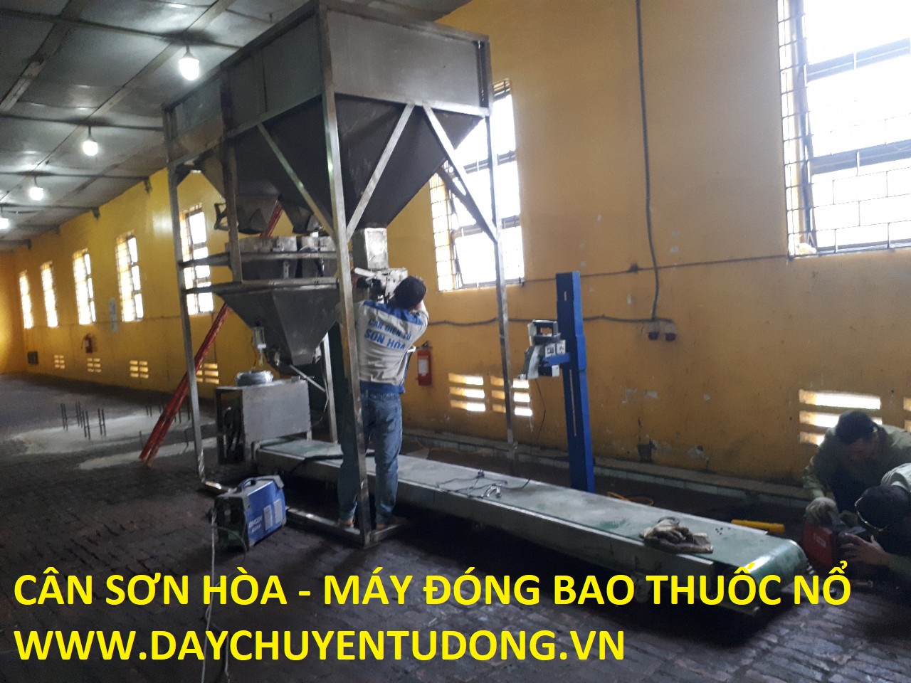 Hệ Thống Cân Định Lượng Đóng Bao Thuốc Nổ